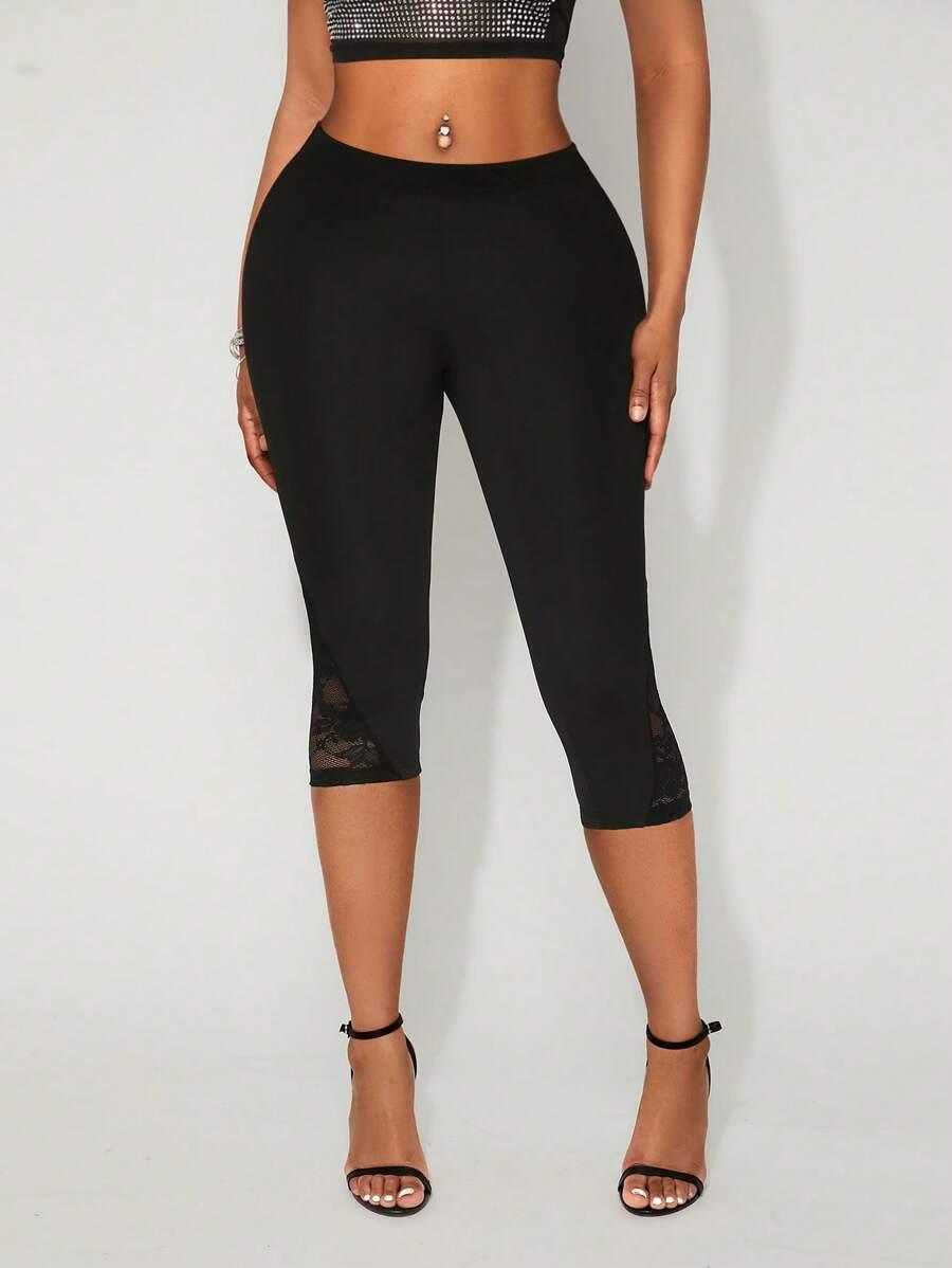 czarne legginsy koronka