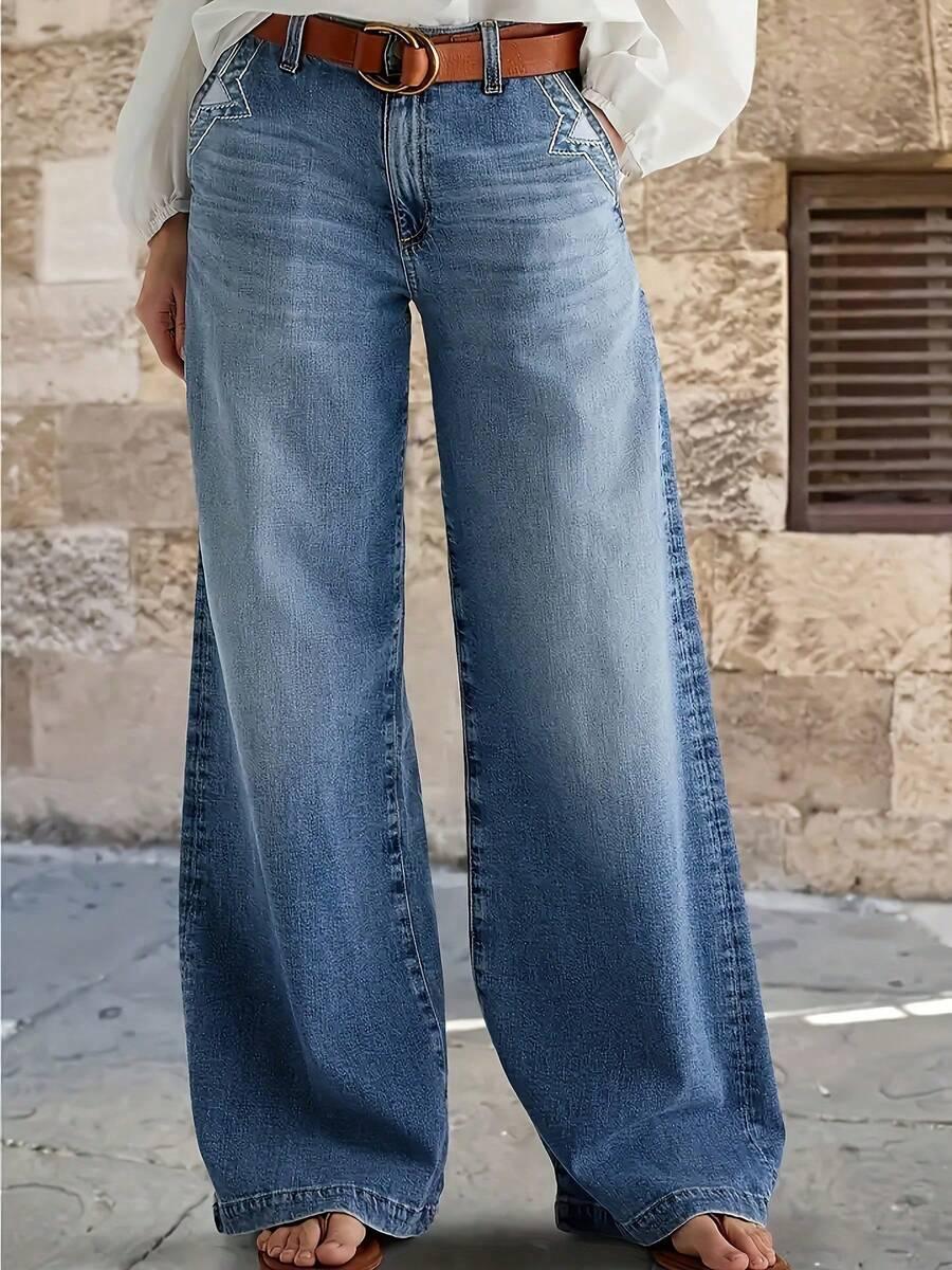 niebieskie spodnie jeans