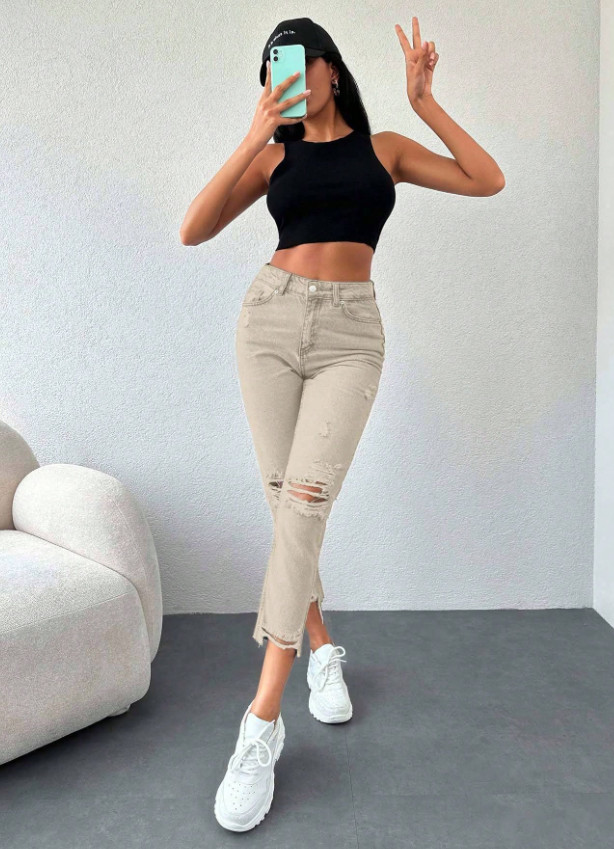BEŻOWE SPODNIE JEANS PRZETARCIA