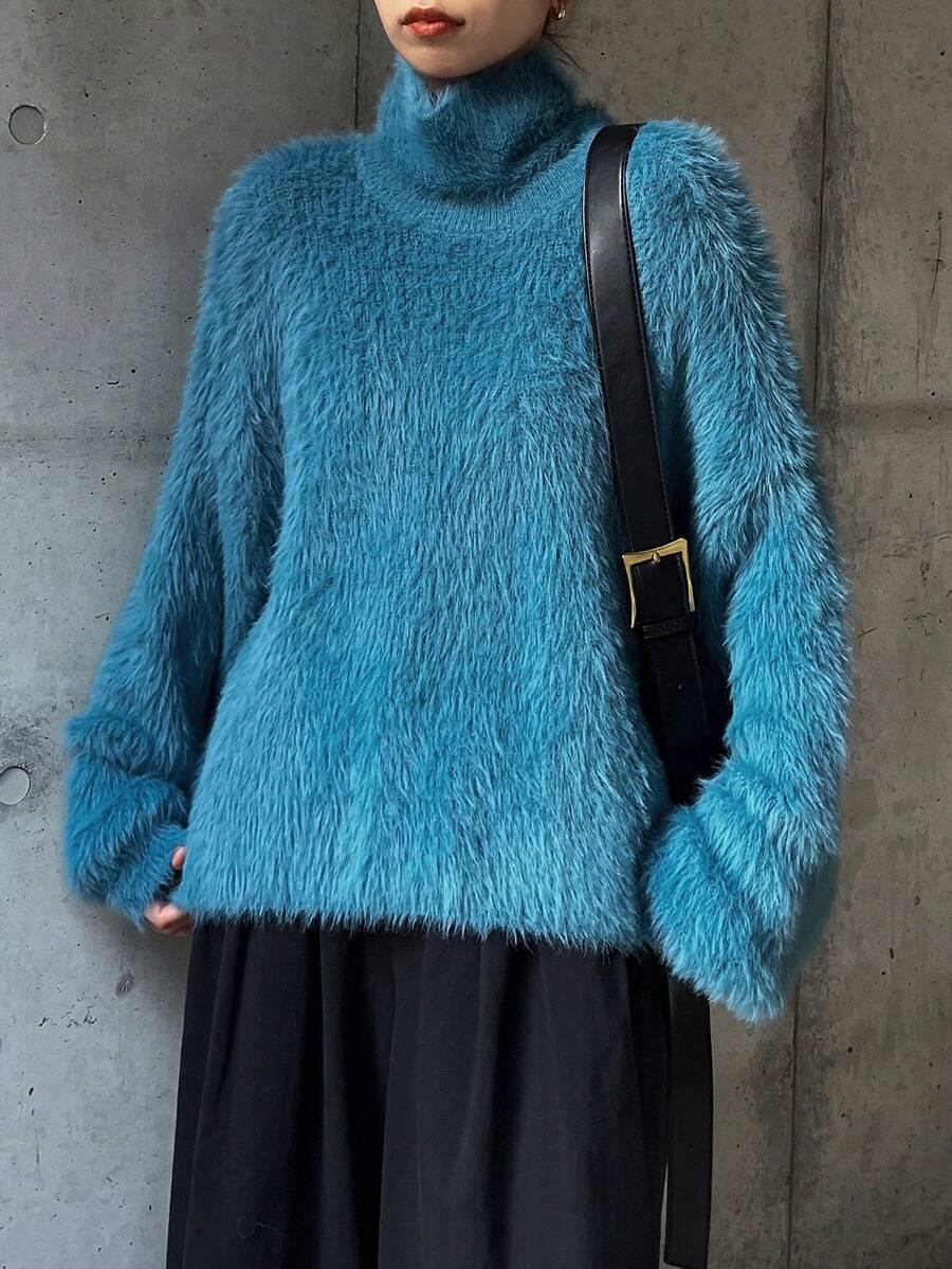 niebieski sweter miś