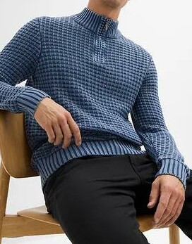 GRUBY SWETER Z EFEKTEM SPRANIA