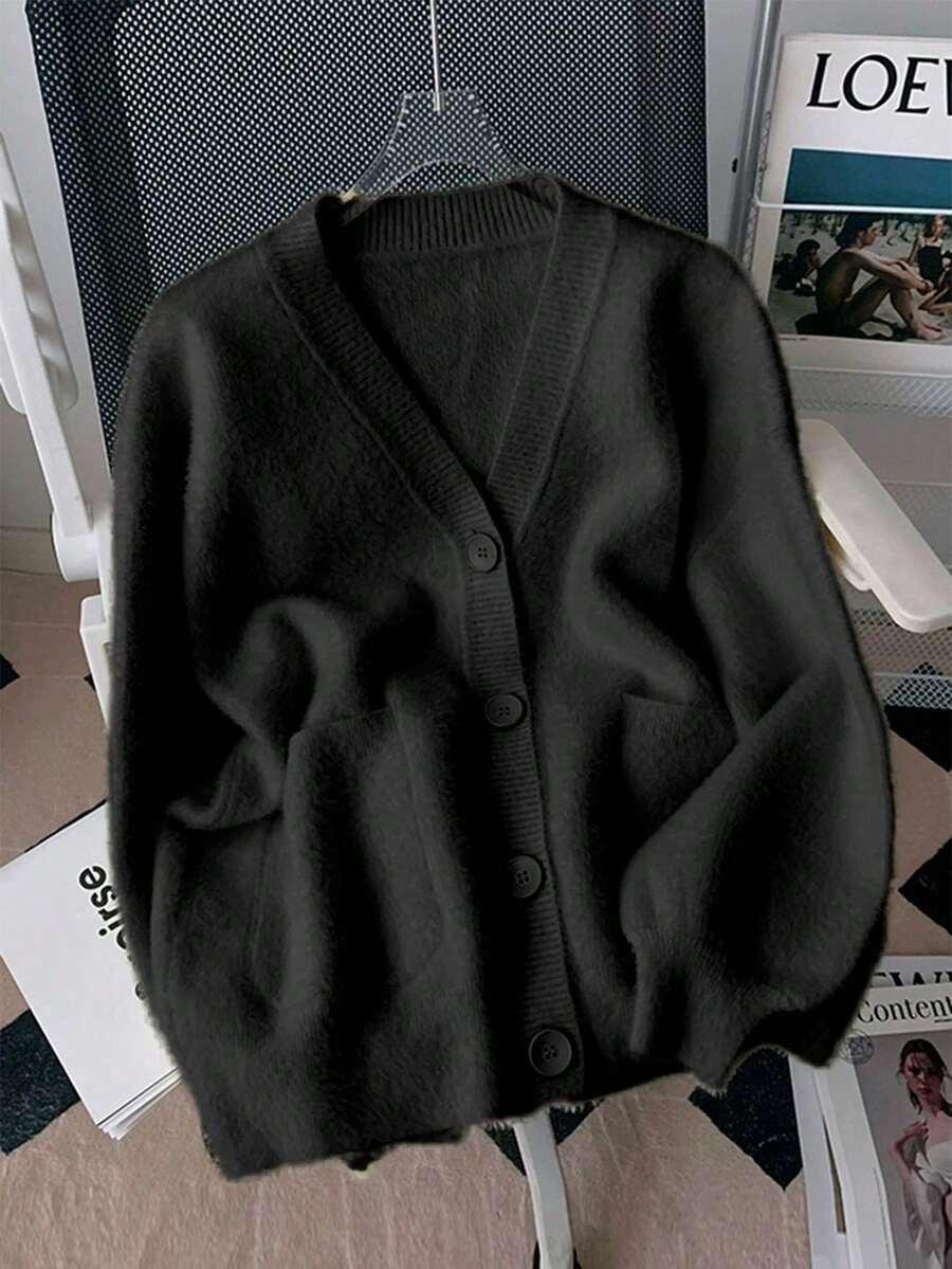 CZARNY SWETER GUZIKI