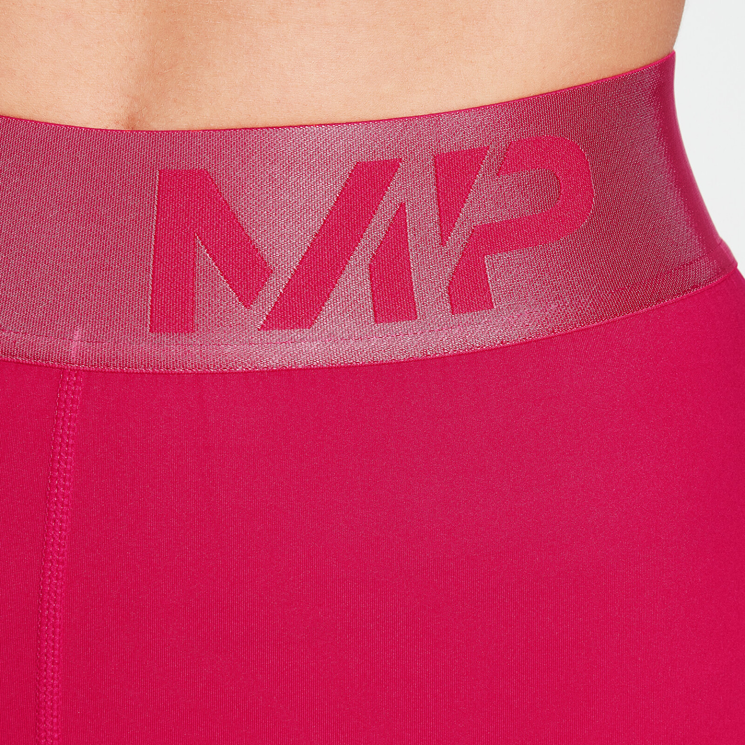 różowe treningowe legginsy tekstura logo