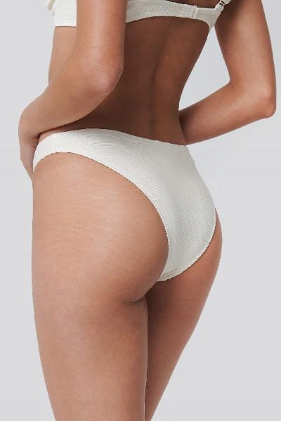 kremowy dół od bikini tekstura 
