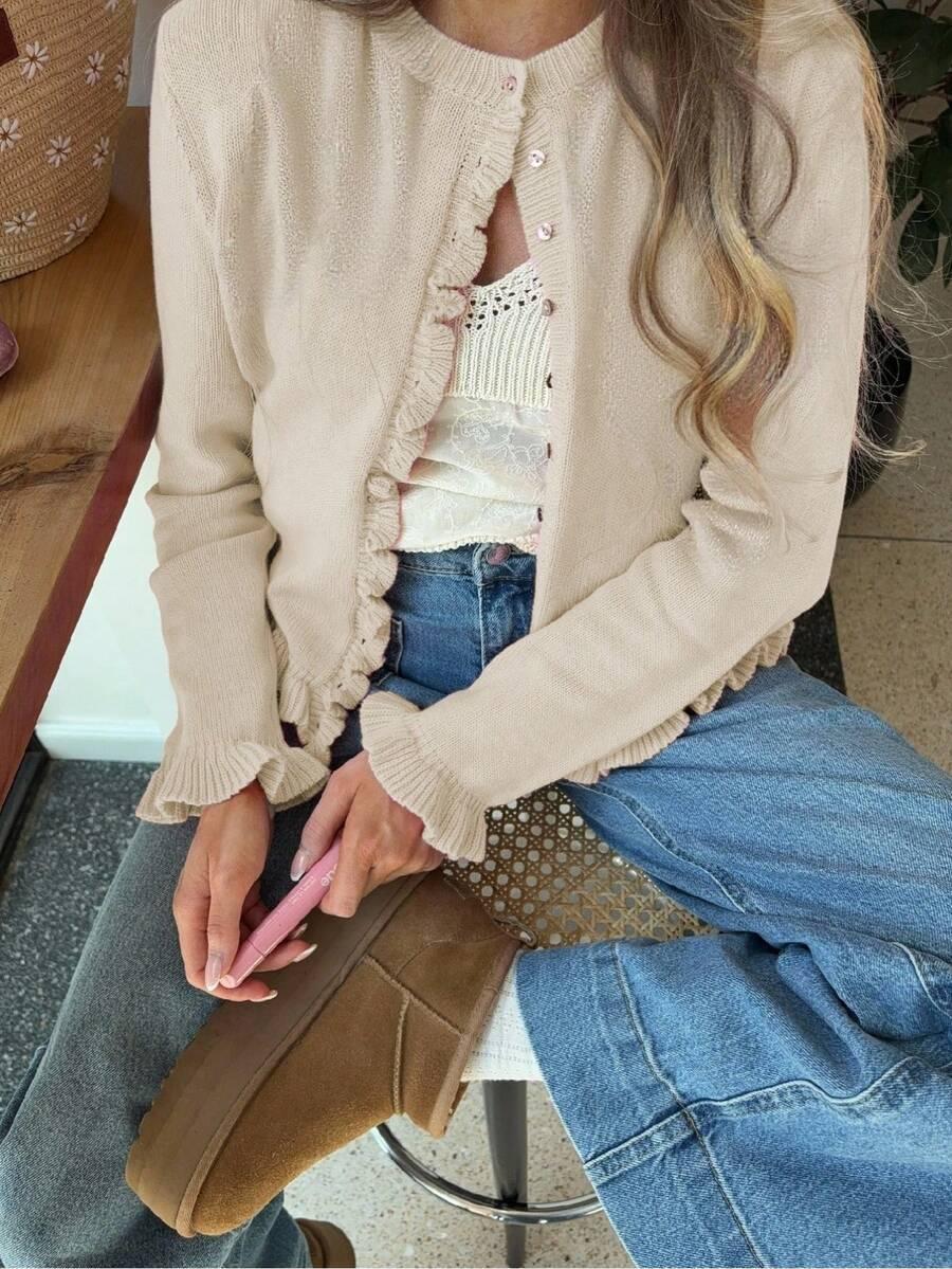 beżowy sweter guziki