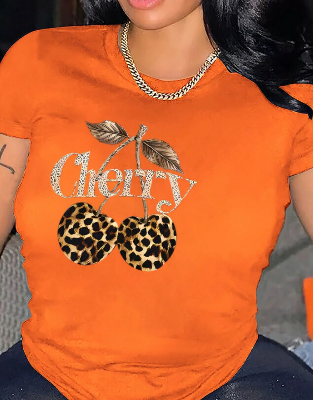 pomarańczowy t-shirt okrągły dekolt nadruk