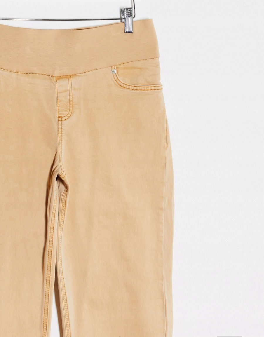 beżowe spodnie jeans kieszenie