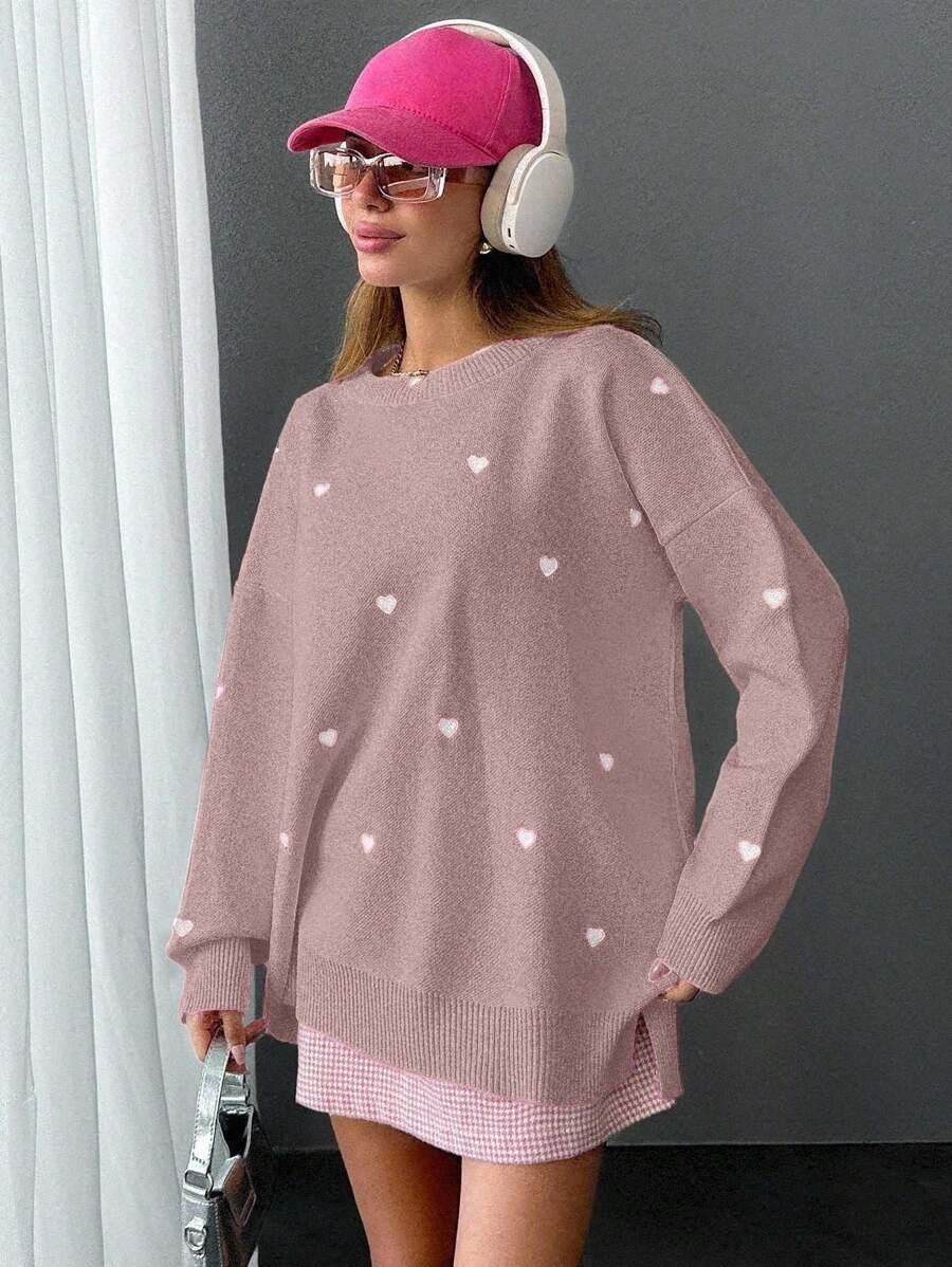 różowy sweter wzór serca