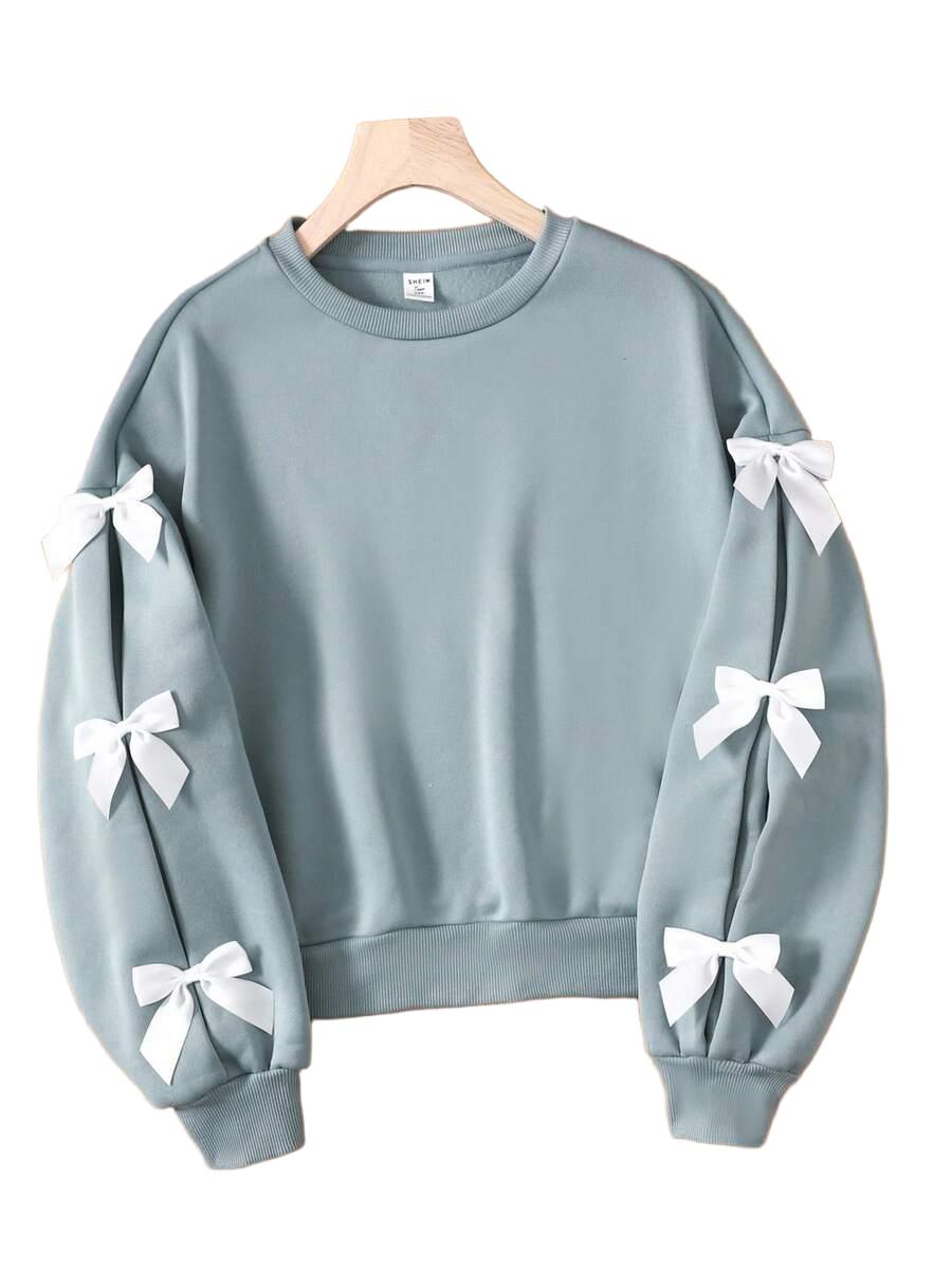 BLUZA DZIECIĘCA Z KOKADTKAMI NA RĘKAWACH