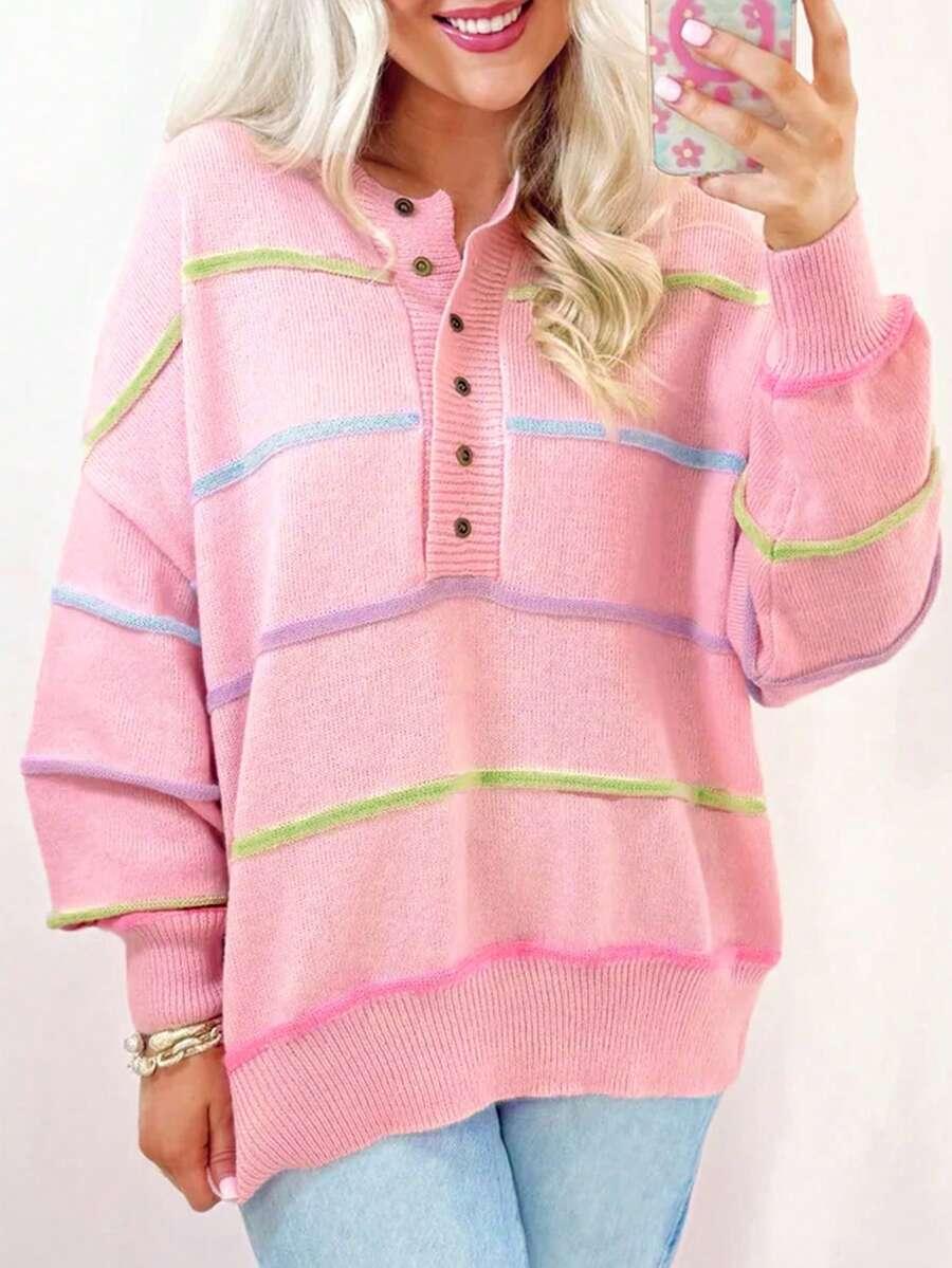różowy sweter paski