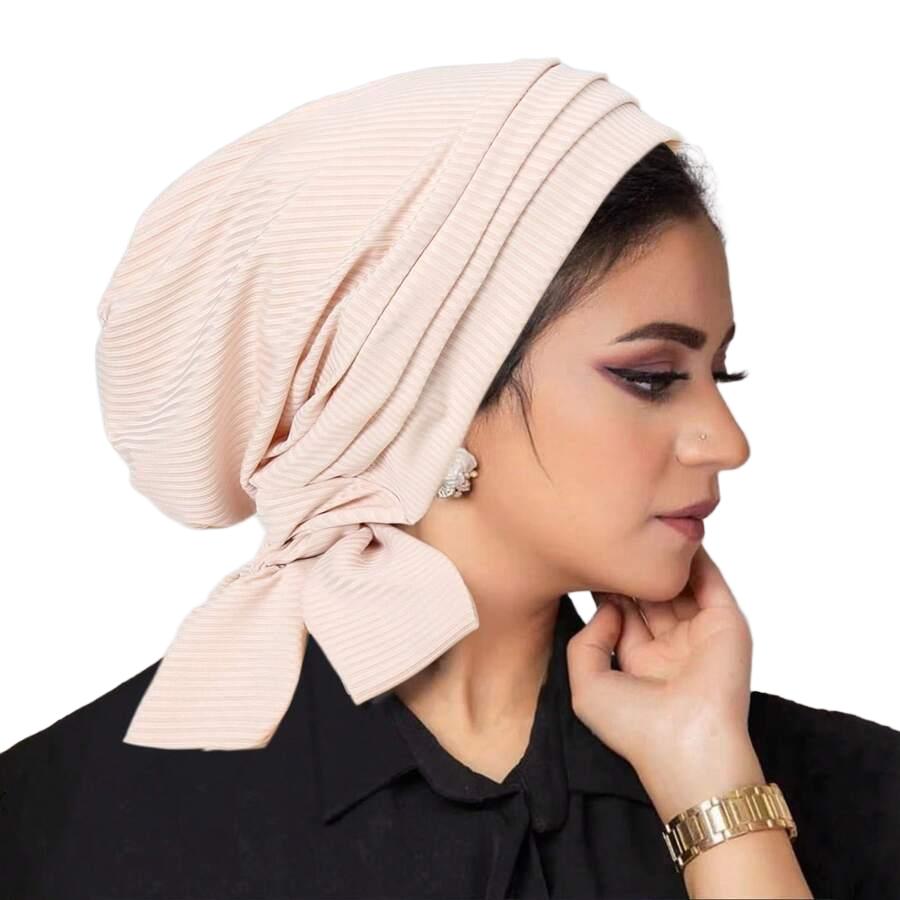 różowy turban wiązanie