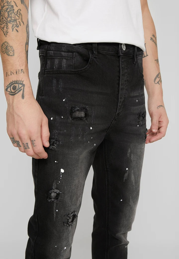 czarne spodnie jeans rocket ripped guziki