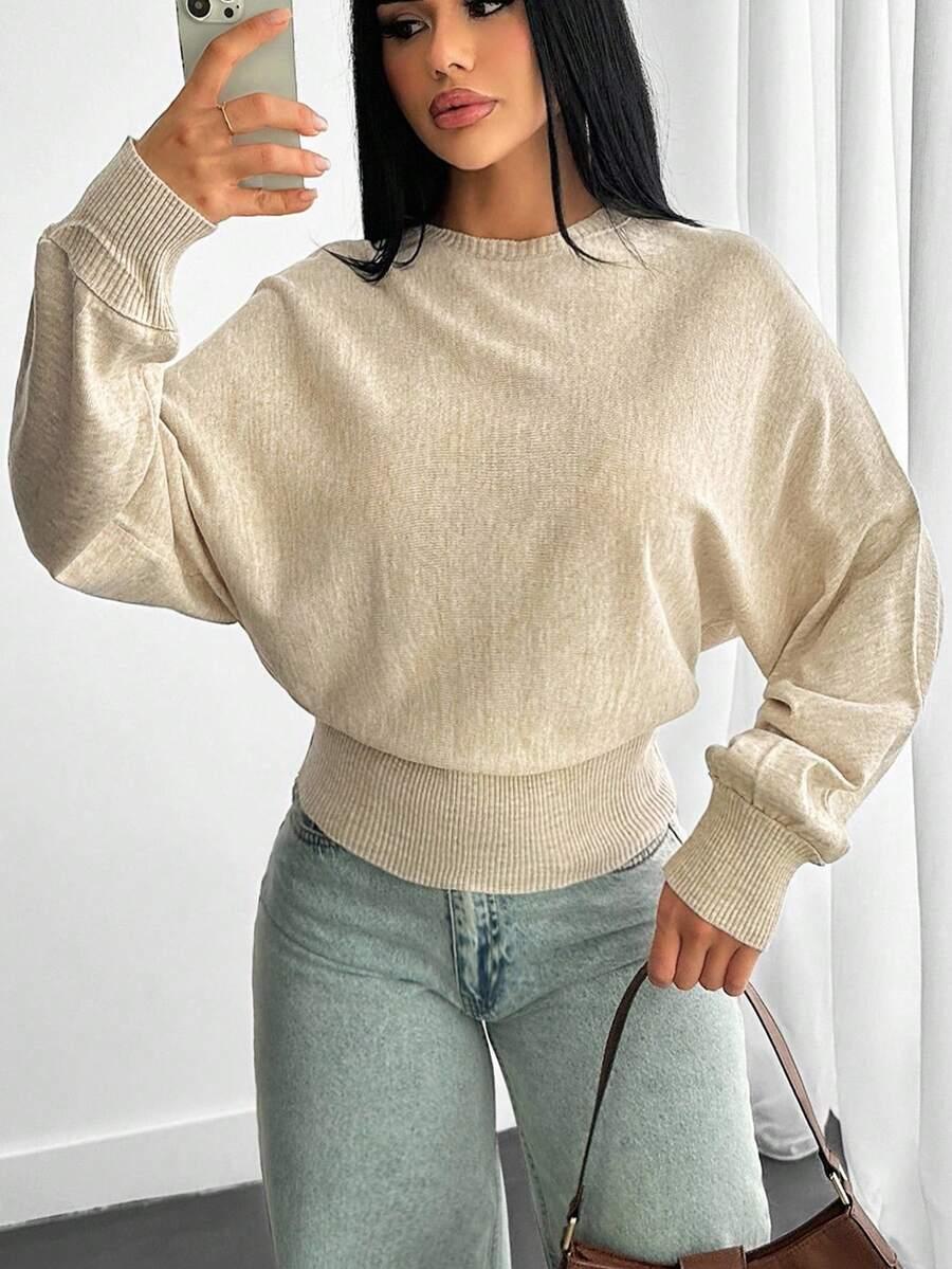 beżowy dzianinowy sweter 