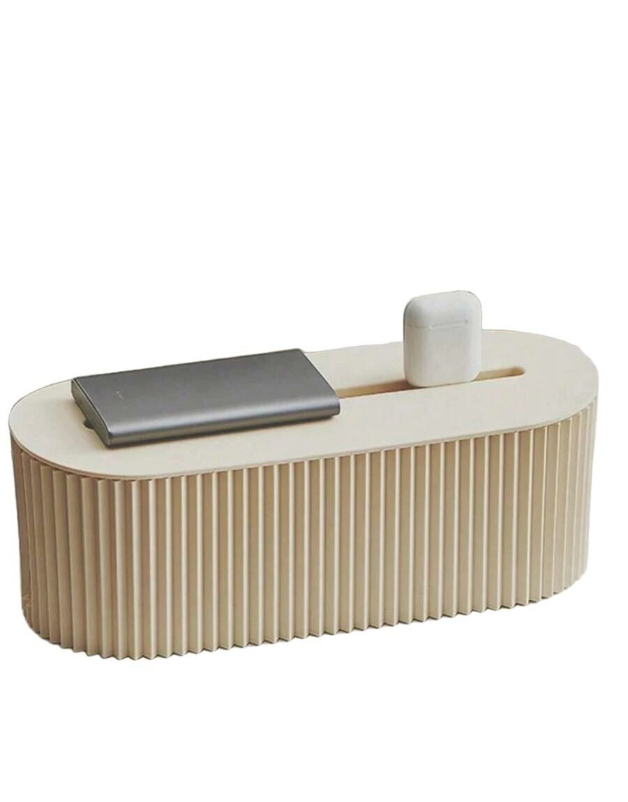 beżowy organizer na kable