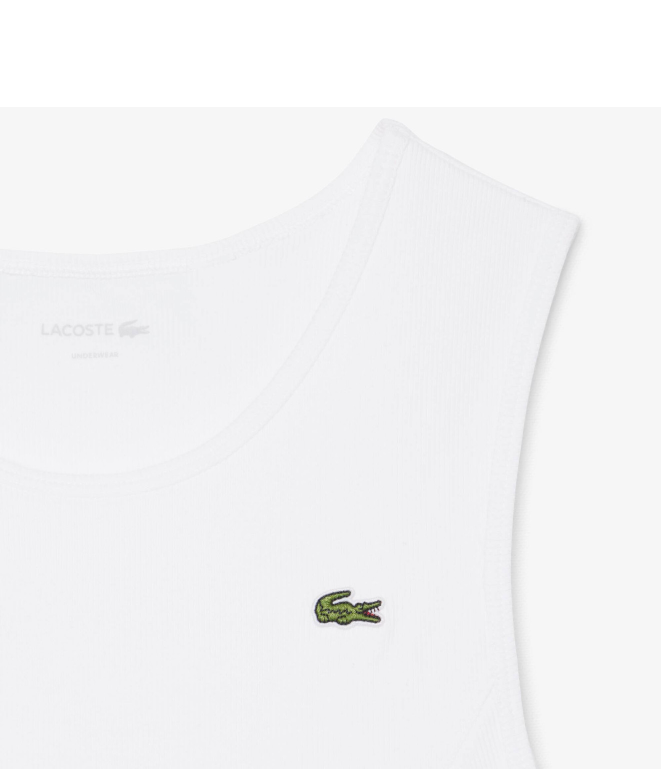 biały crop top bez rękawów logo haft