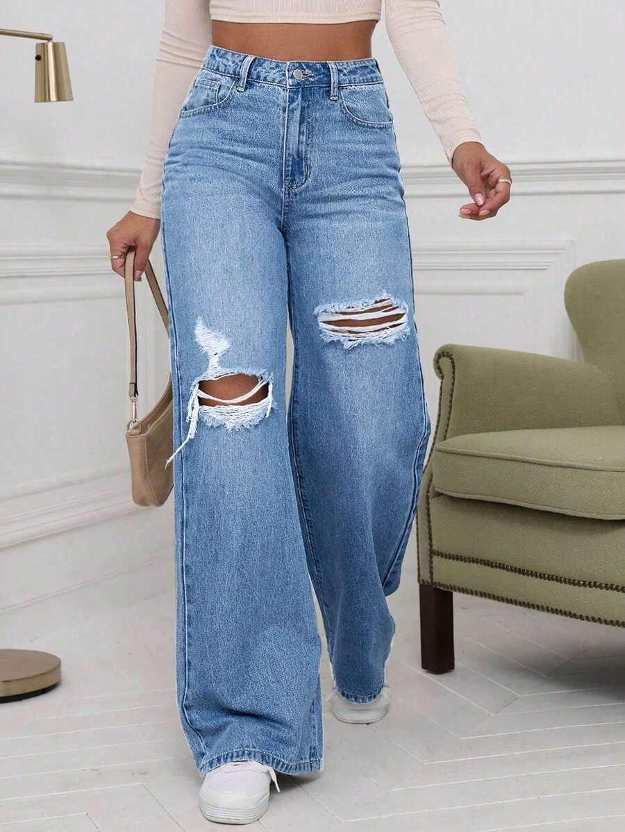 SPODNIE JEANS PRZETARCIA 