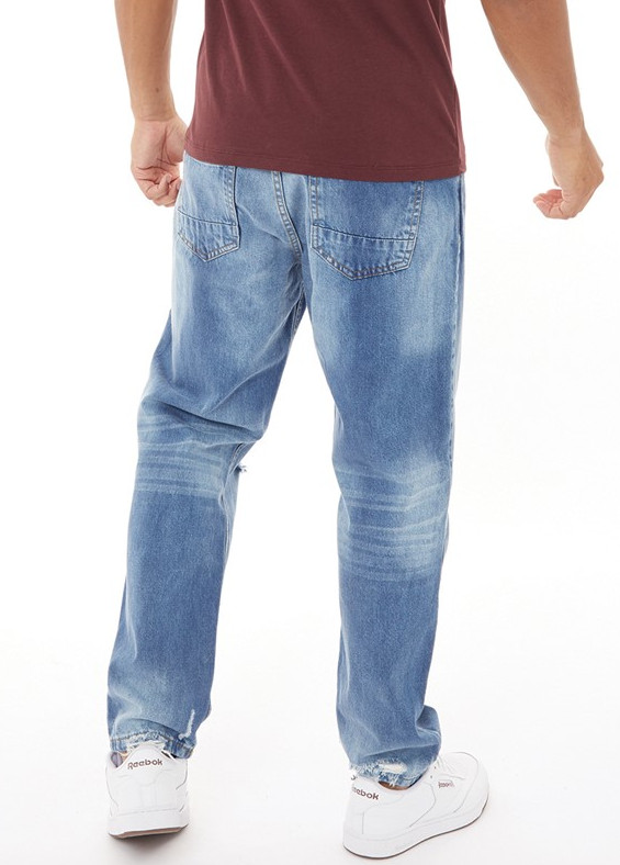 niebieskie spodnie jeans przetarcia 