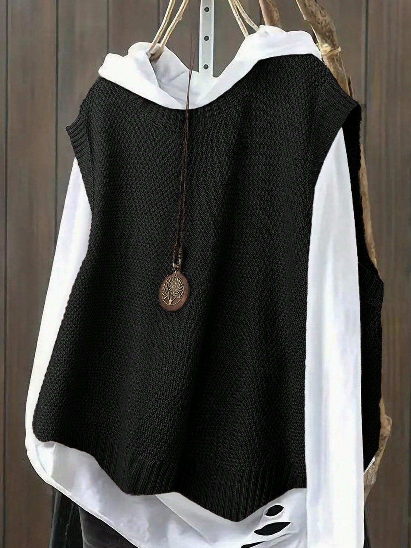 czarny sweter bez rękawów