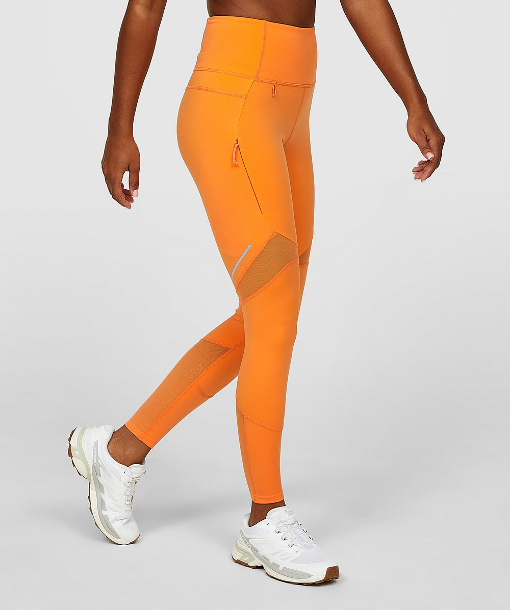pomarańczowe legginsy Altitude wstawka siateczka logo