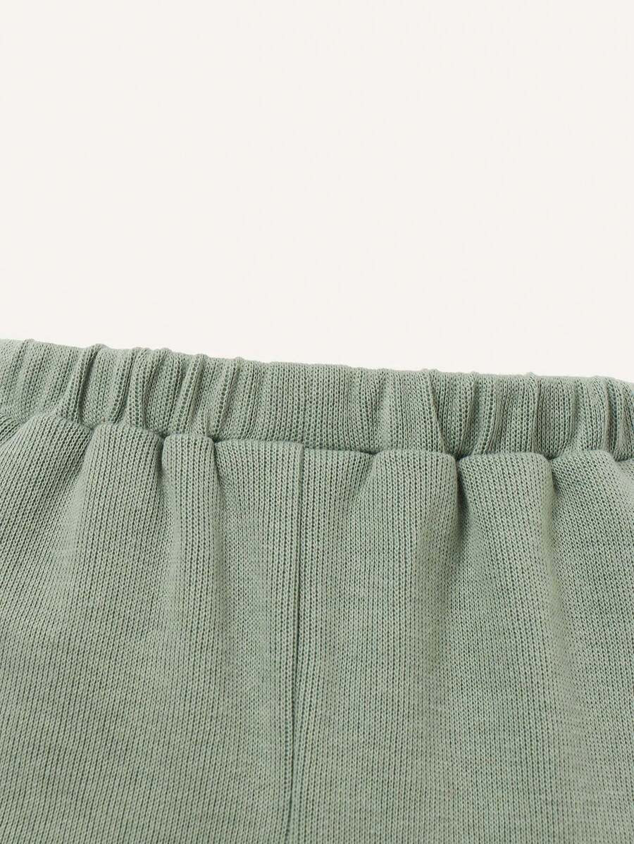 zielony komplet dresowy bluza spodnie napis cool