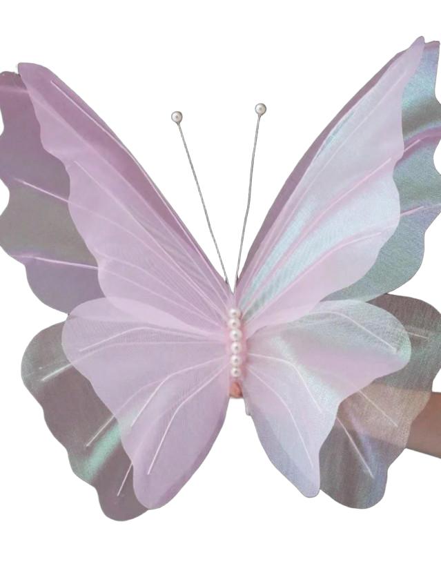 różowy sztuczny motyl