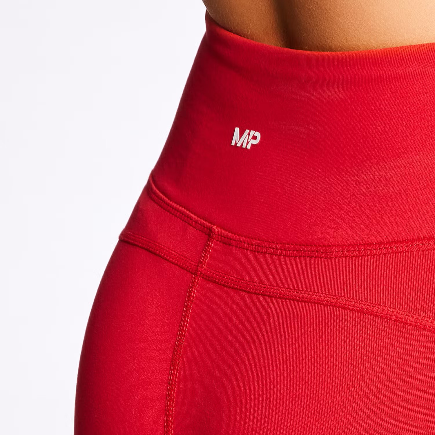 czerwone sportowe legginsy wstawka siateczka logo