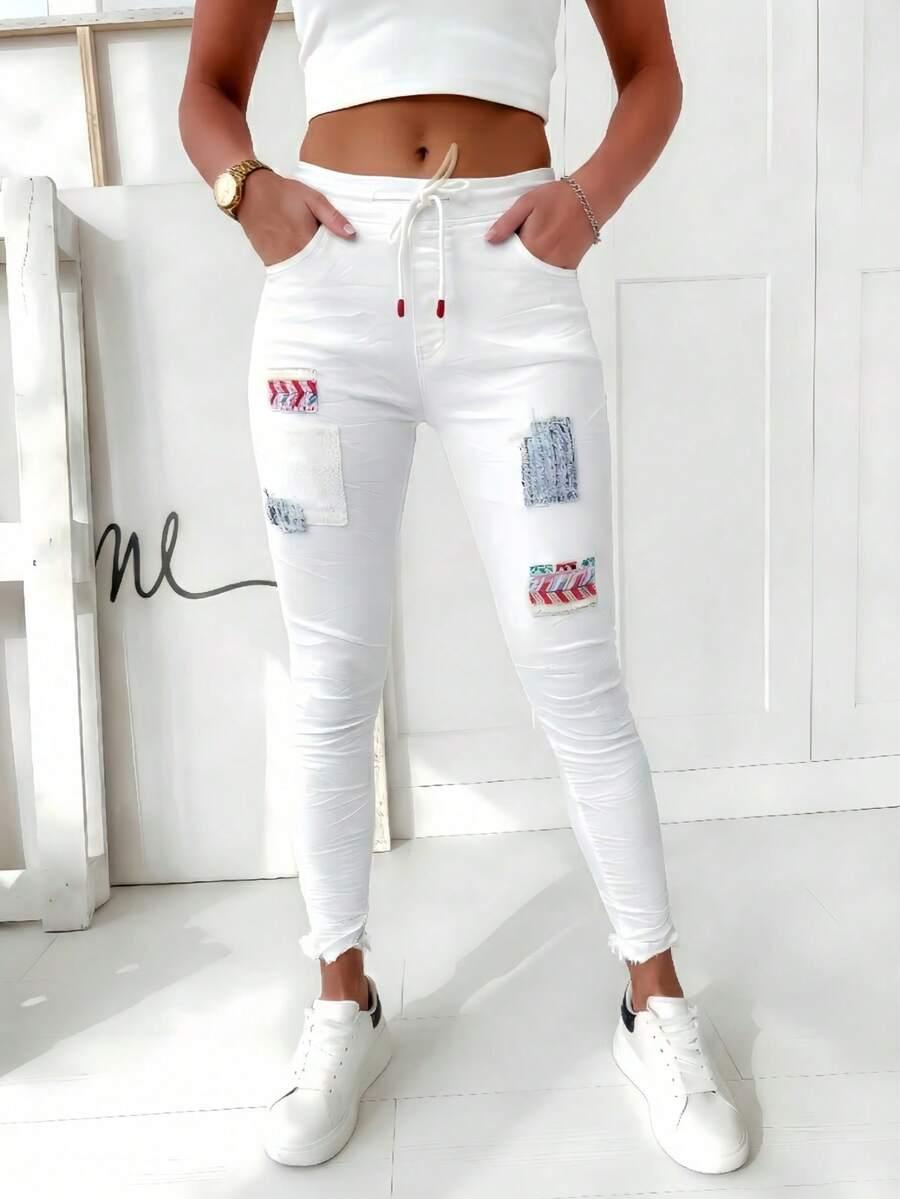 BIAŁE SPODNIE JEANS