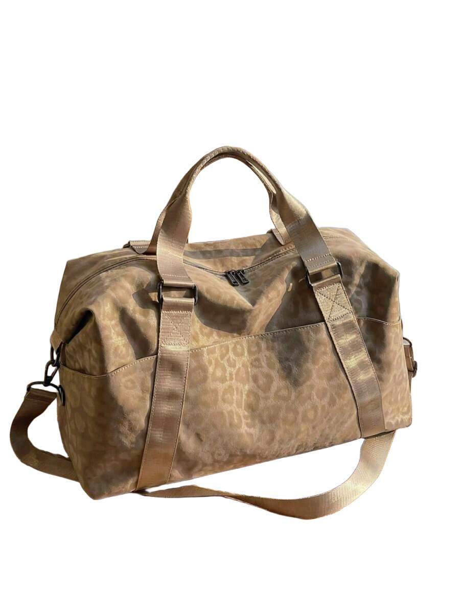 beżowa torba podróżna animal print