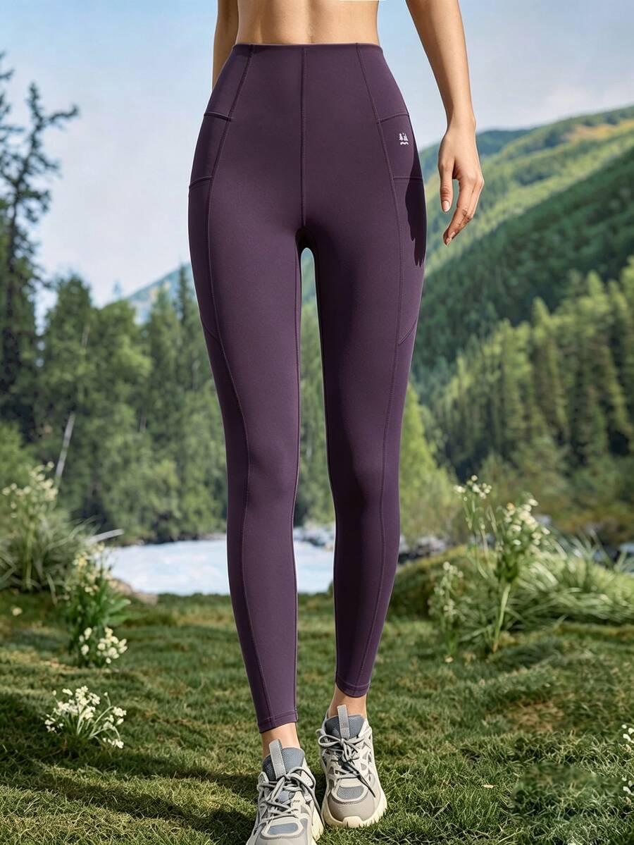 fioletowe legginsy kieszenie