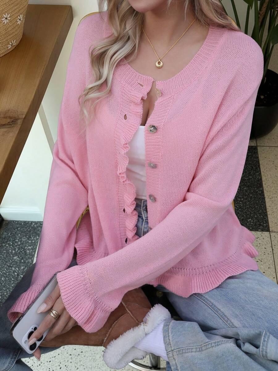 RÓŻOWY SWETER GUZIKI