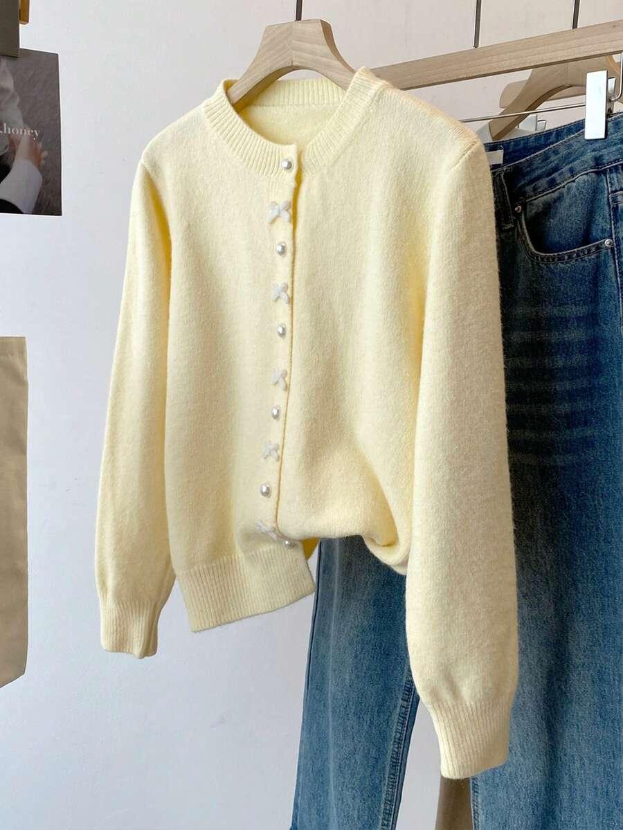 żółty sweter guziki