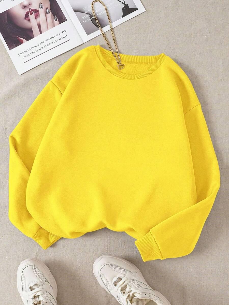żółta gładka bluza z okrągłym dekoltem
