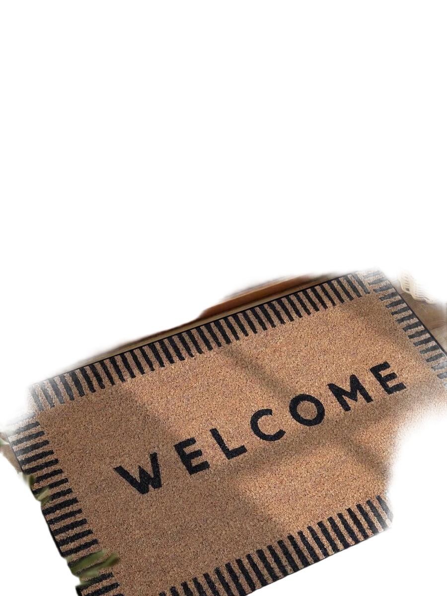 brązowa wycieraczka napis welcome