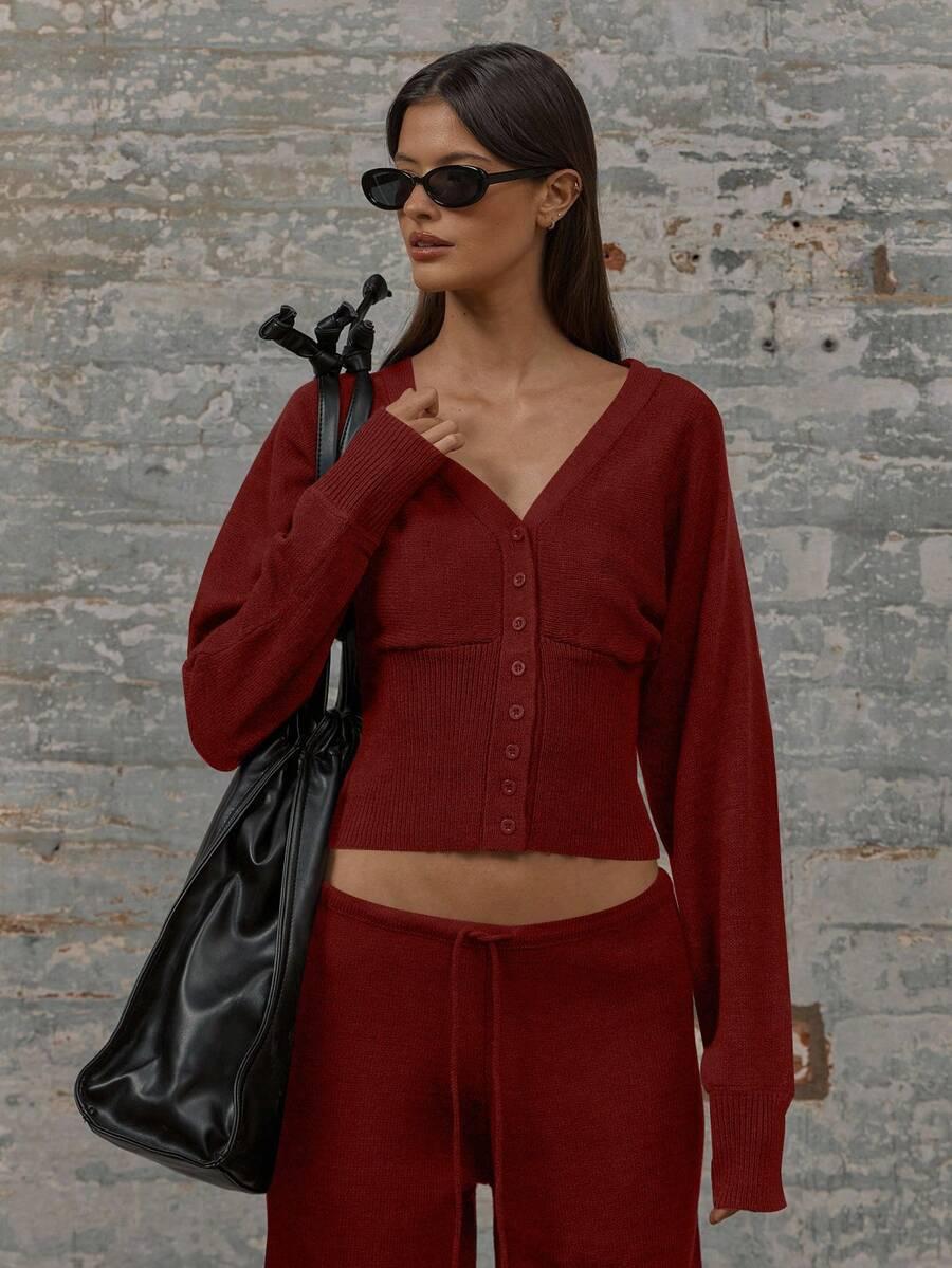 czerwony sweter guziki