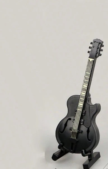 czarna mini gitara