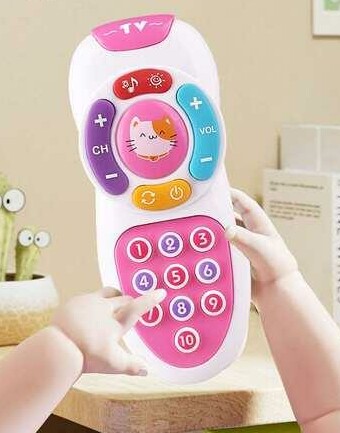 biały telefon zabawka