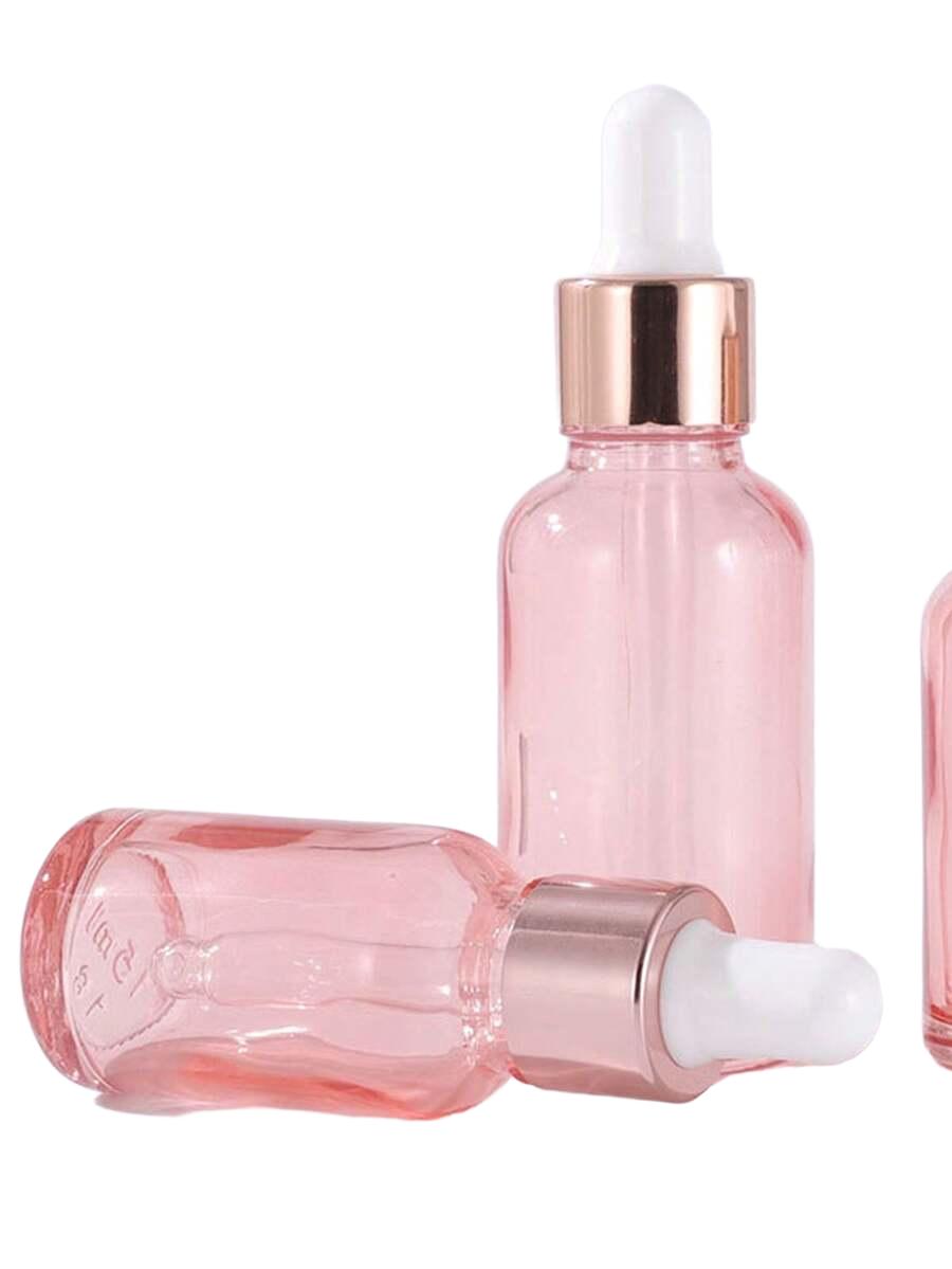 Różowa butelka szklana z pipetą 
