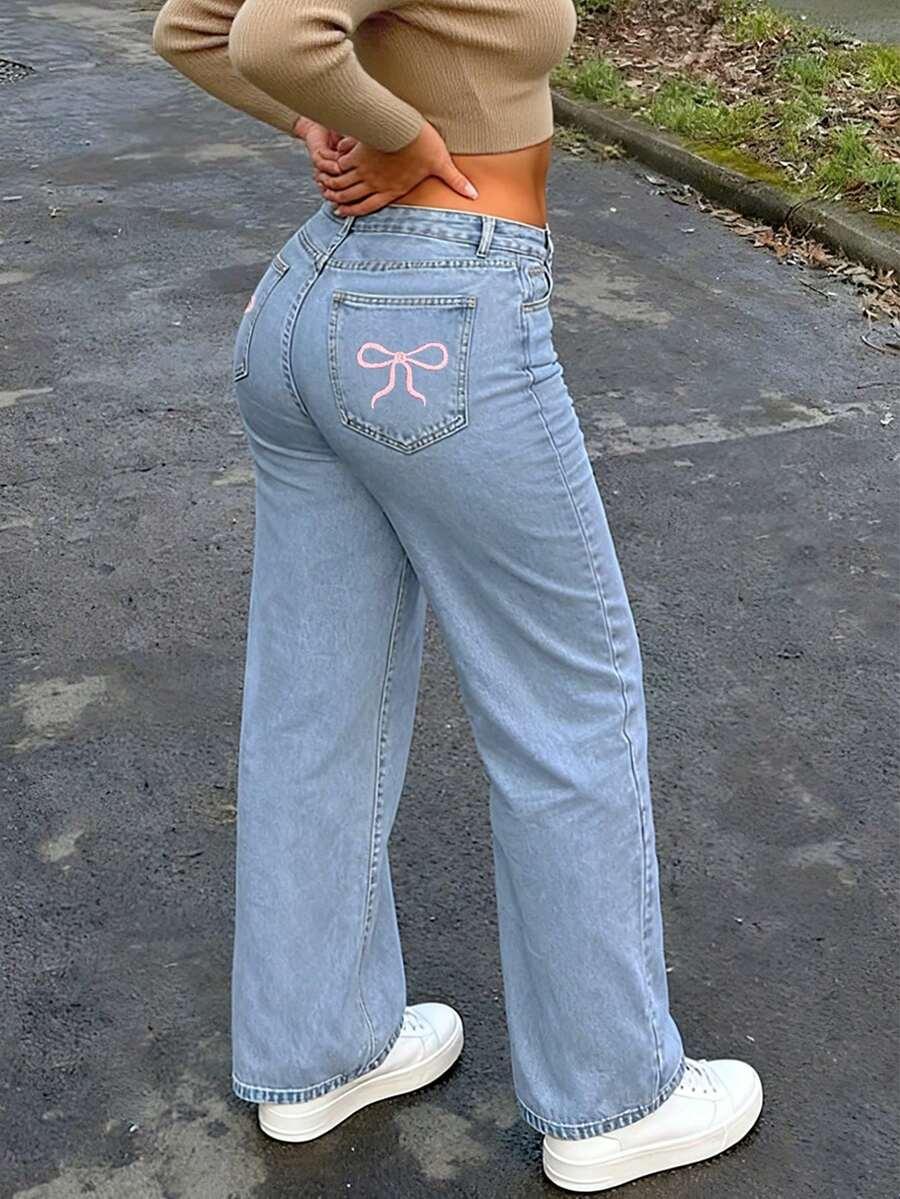 NIEBIESKIE SPODNIE JEANS HAFT KOKARDY