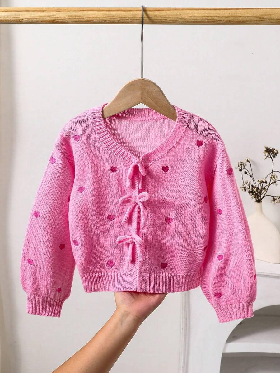 różowy sweter wiązanie