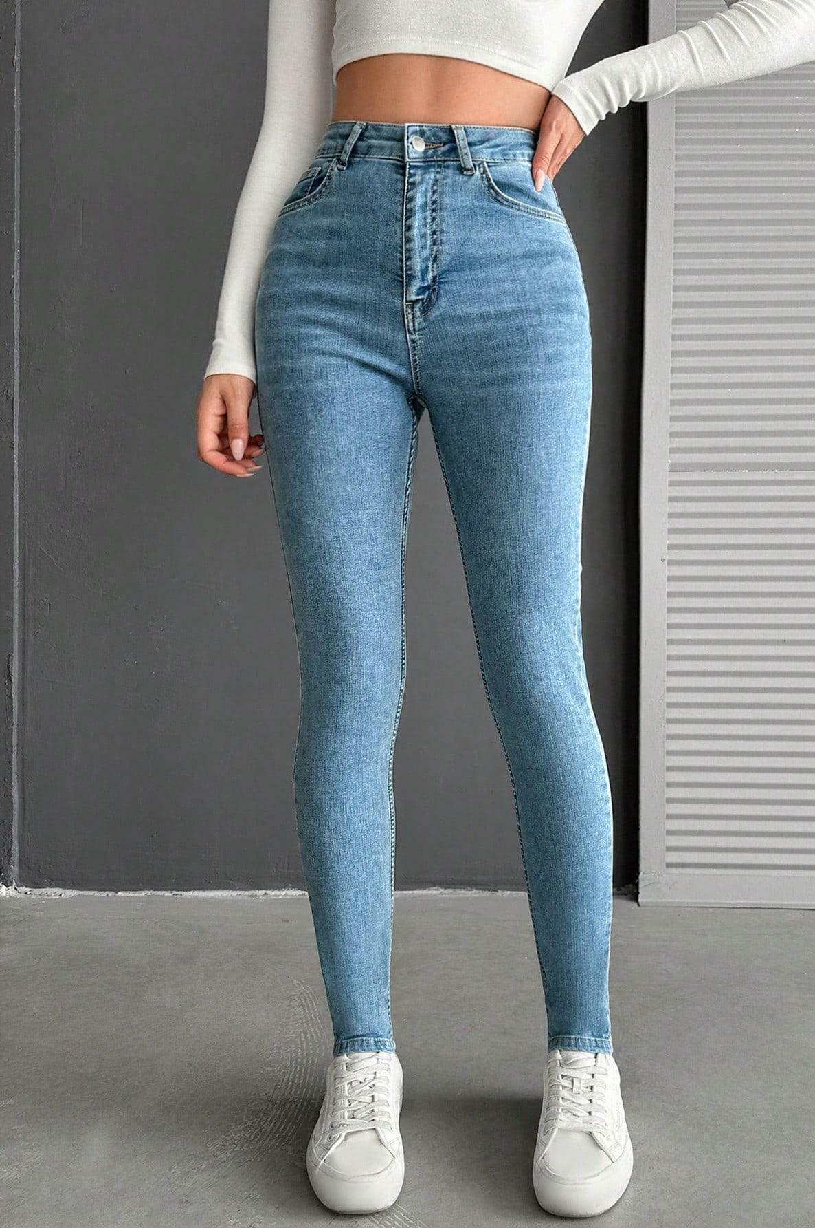 niebieskie spodnie rurki jeans high waist kieszenie