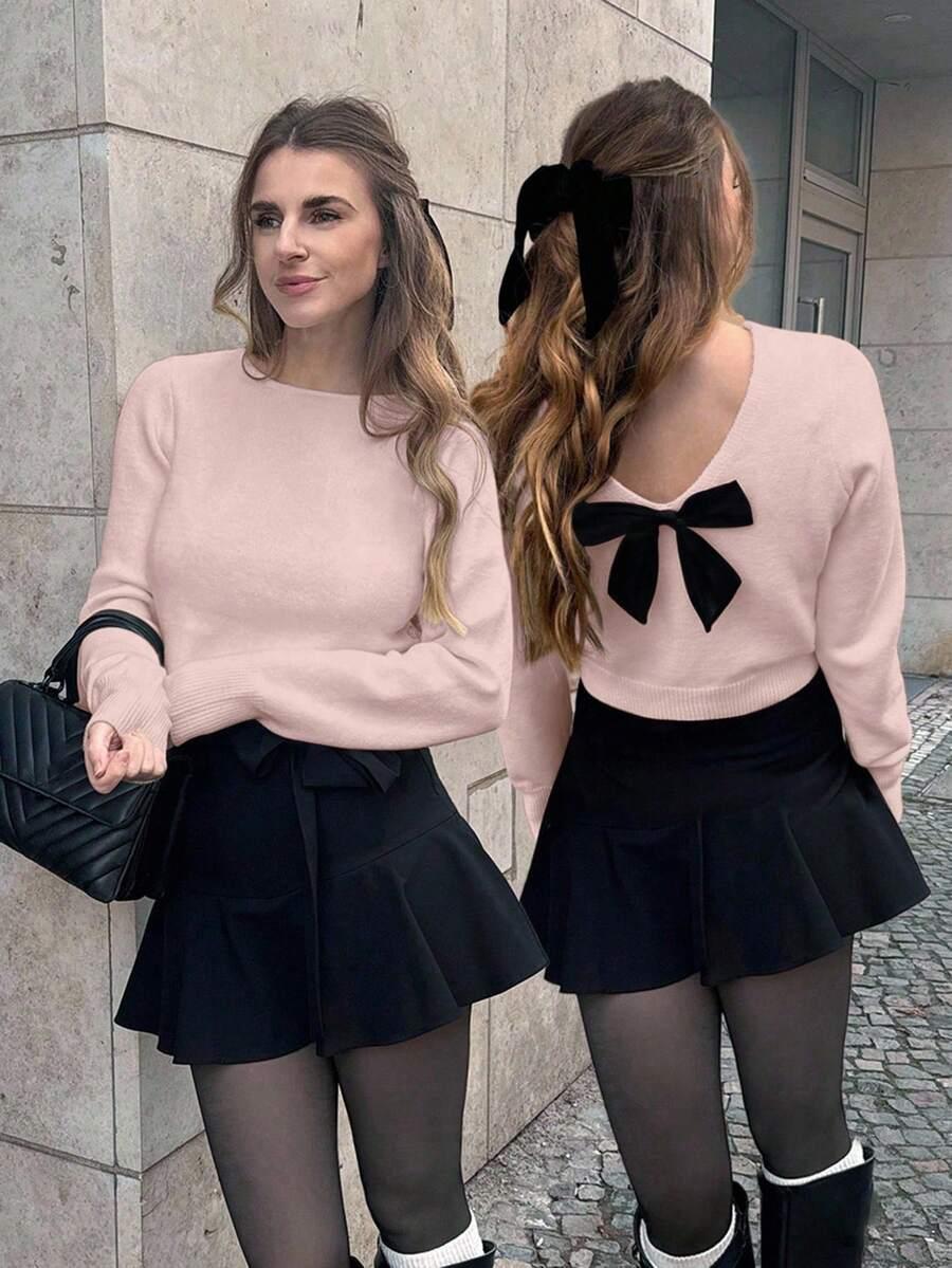 różowy sweter długi rękaw