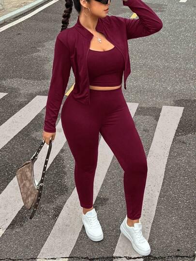 czerwony komplet top bluza legginsy