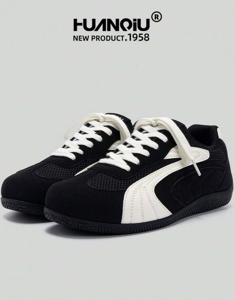 sznurowane czarne buty sportowe