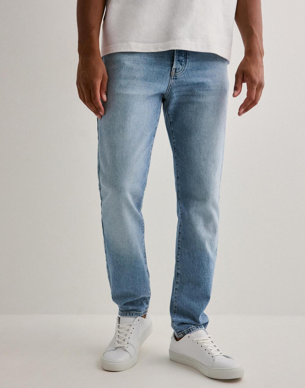 NIEBIESKIE SPODNIE jeansowe