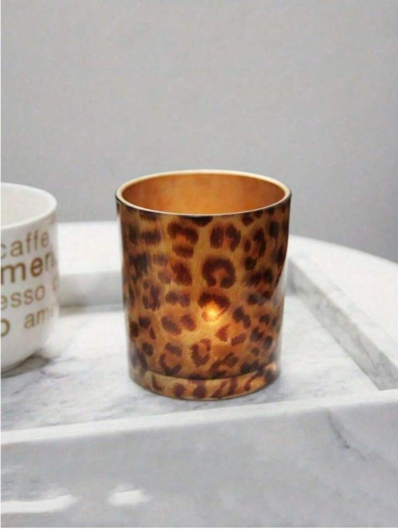 szklany świecznik animal print