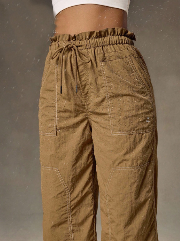 brązowe spodnie outdoor wiązanie