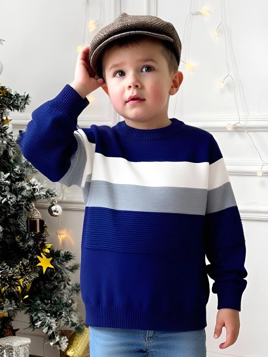niebieski sweter paski