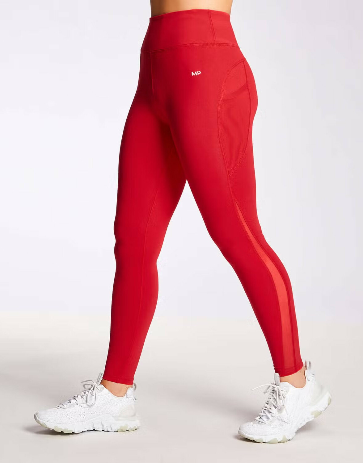 czerwone sportowe legginsy wstawka siateczka logo