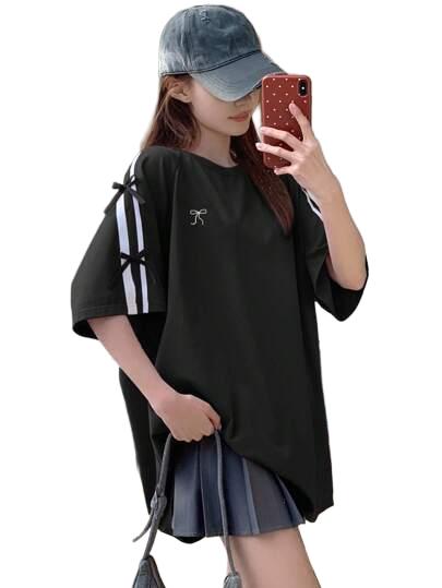 T-SHIRT Z OZDBONYMI WSTĄŻKAMI
