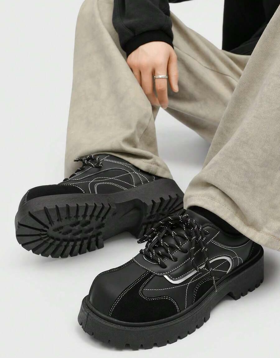 czarne sznurowane buty 
